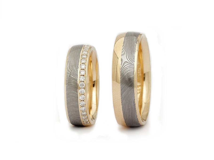 Trauringpaar Damaszenerstahl Gelbgold mit Brillanten 0,300ct 