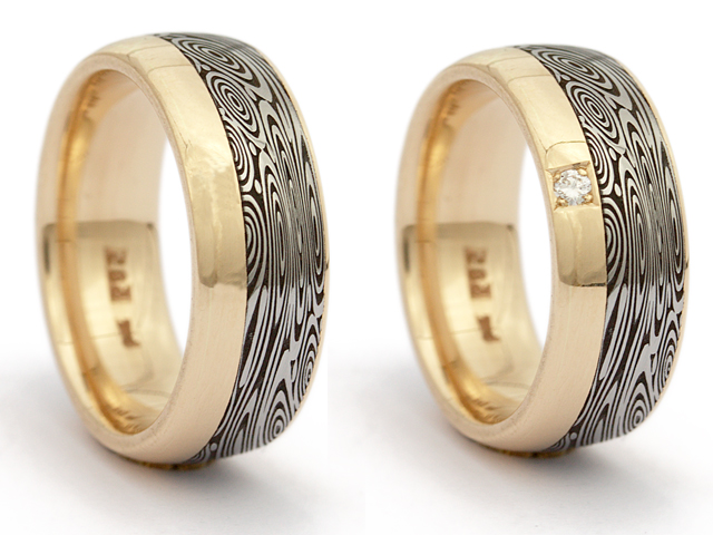 Trauringpaar Damaszenerstahl Gelbgold mit Brillant 0,050ct